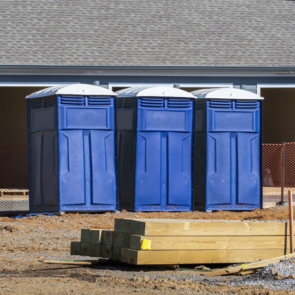 what is the cost difference between standard and deluxe porta potty rentals in Bernard Iowa